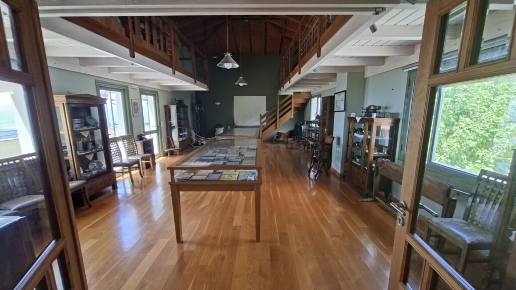 The Culinary Museum at Arcadiani, Psari — vitrines of vintage cookbooks and kitchen tools