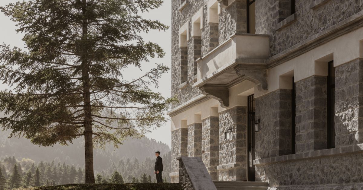 The restored mountain sanatorium building, now MANNA, above Magouliana